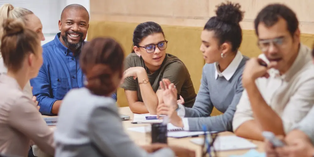 Leadership team working together around a table