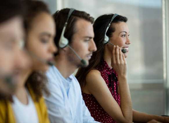 four people with headsets on