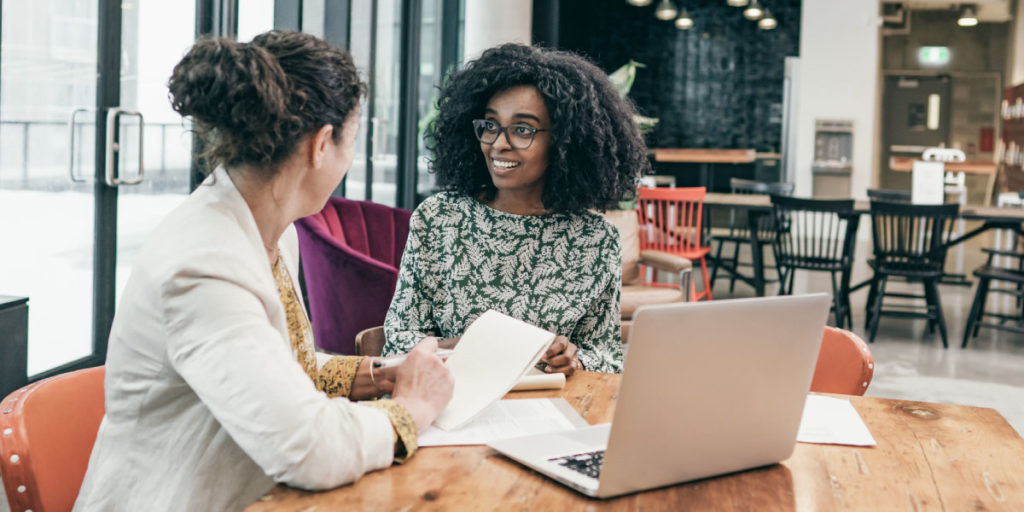 two women in conversation