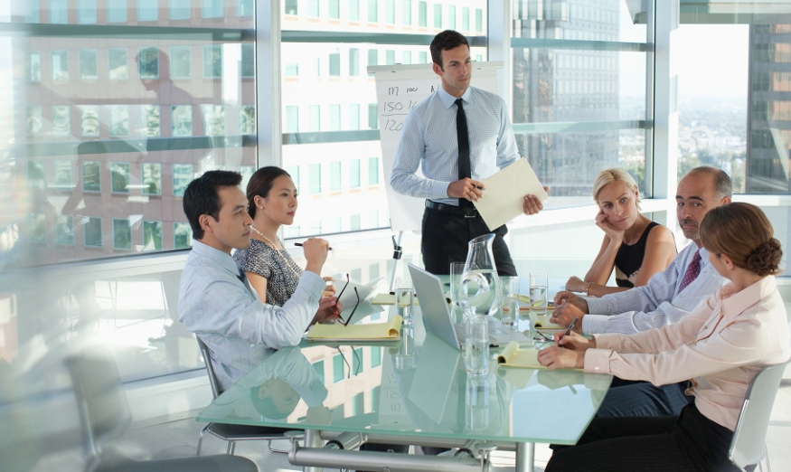 man leading meeting