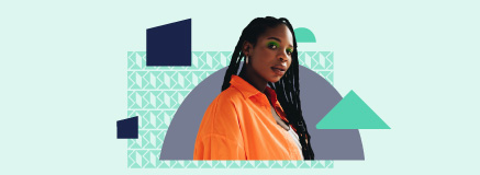 young Woman with dreadlocks and orange shirt