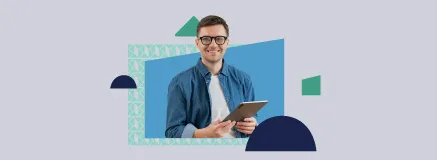 Man with glasses holding an ipad