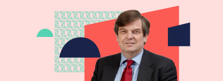 Roger Siddle surrounded by branded shapes