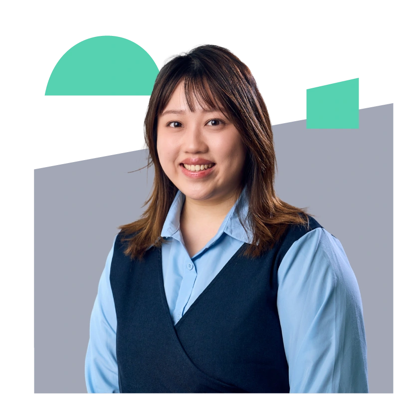 Professional female surrounded by branded shapes